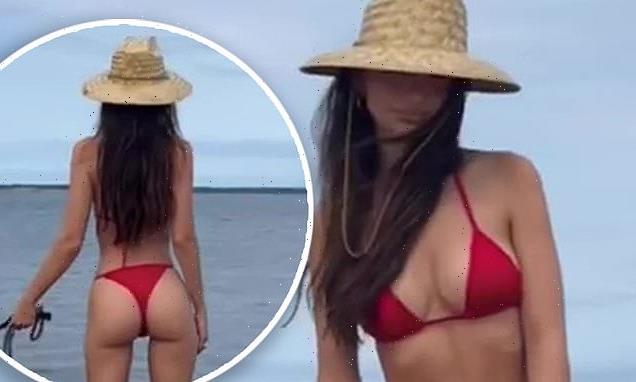 Emily Ratajkowski puts on cheeky display in  skimpy red bikini