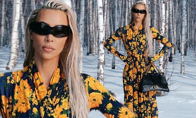 Kim Kardashian looks stylish in a long yellow-and-black dress