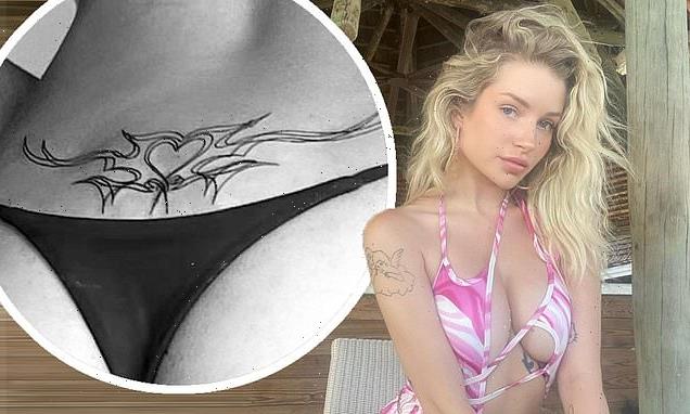 Lottie Moss showcases new 'tramp stamp' on her peachy posterior