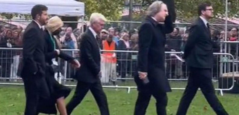Phil and Holly were ‘heckled’ by mourners as they ‘skipped’ queue