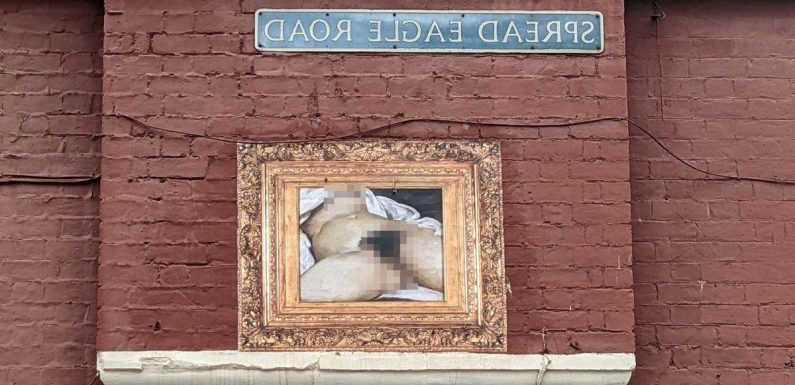 Pranksters smear naked woman portrait across ‘Spread Eagle Road’ in city centre