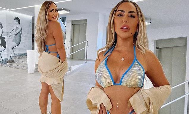 Sophie Kasaei shows off results of her breast reduction in a bikini