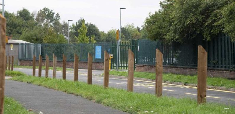 We're furious after the council installed huge wooden posts to stop us parking outside school, it's like a battlefield | The Sun