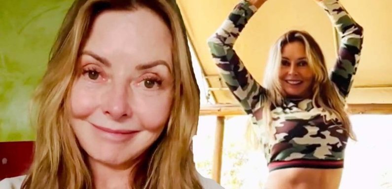 Carol Vorderman dances in skintight leggings after slamming critics