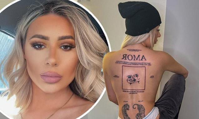 Demi Sims goes topless as she shows off her HUGE new back tattoo