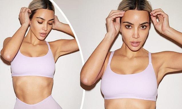 Kim Kardashian puts her eye-popping 24inch waistline on display