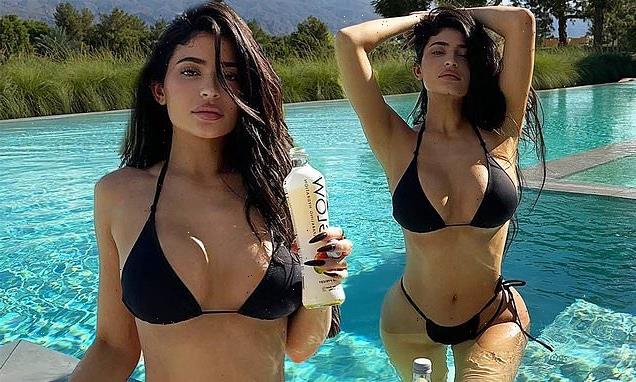 Kylie Jenner displays her enviable curves in tiny black bikini