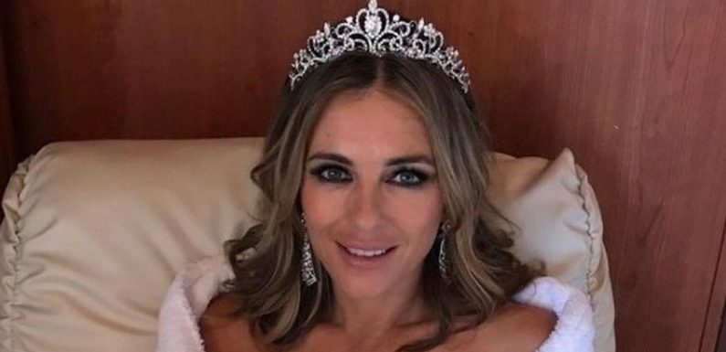 Liz Hurley dubbed ‘sexiest woman ever’ as she pours figure into plunging satin