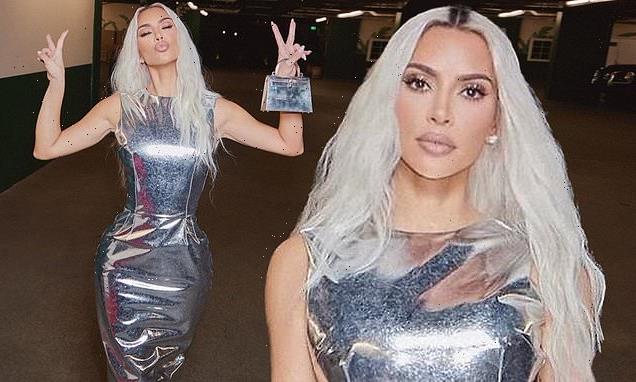 Kim Kardashian looks out of this world in a metallic silver dress