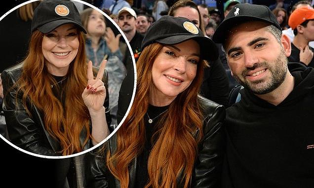 Lindsay Lohan and husband Bader Shammas watch NBA basketball game