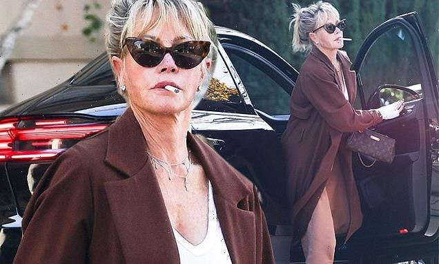 Melanie Griffith puffs on cigarette while going to Beverly Hills salon