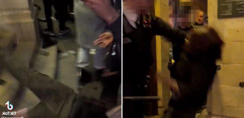 Asake Brixton: Shock moment woman thrown down stairs after tussle with cops during concert chaos that left eight injured | The Sun