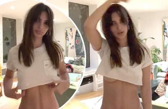 Emily Ratajkowski flashes underboob as she dances in a tiny crop top