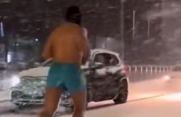Lunatic Brits going crazy in snow from half-naked jogger to station snowball war