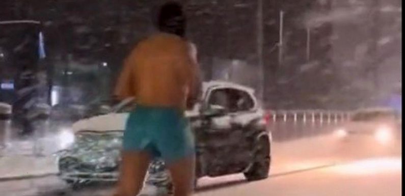 Lunatic Brits going crazy in snow from half-naked jogger to station snowball war