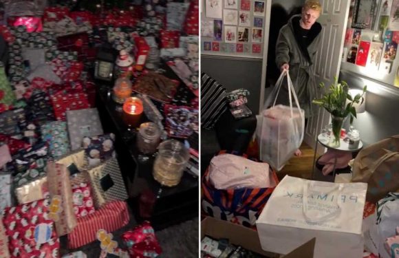 Man hits back at trolls after sharing his present-covered living room, insisting he can spend his money however he wants | The Sun