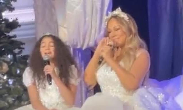 Mariah Carey duets with her daughter Monroe, 11, during live concert