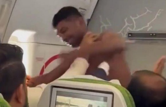 Shirtless brute brawls with passenger on packed plane in row over front seat