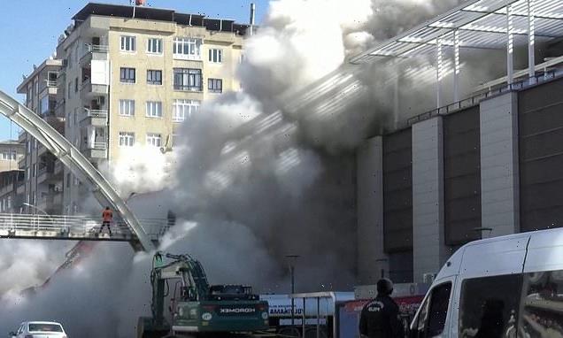 Apartment block collapses around demolition workers in Turkish town