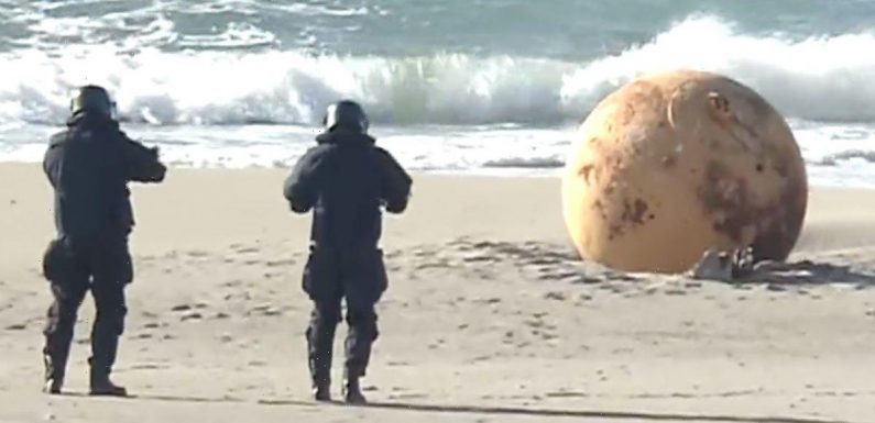 Huge mystery metal sphere discovered on beach – as cops baffled by what it is