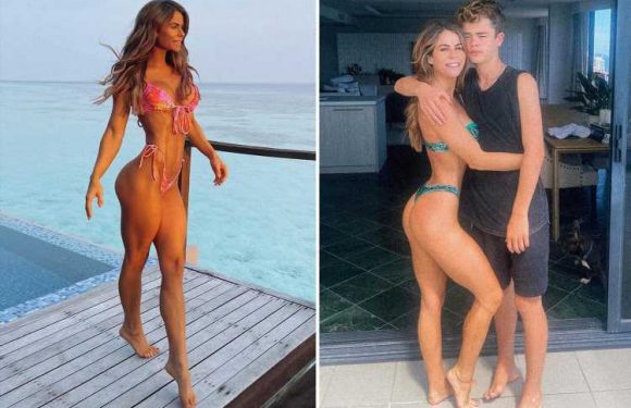 Mum forced to hit back at trolls over ‘sexualised’ photo of her wearing a bikini while hugging her teenage son | The Sun