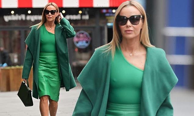 Amanda Holden goes braless in a tight green vest and a matching skirt