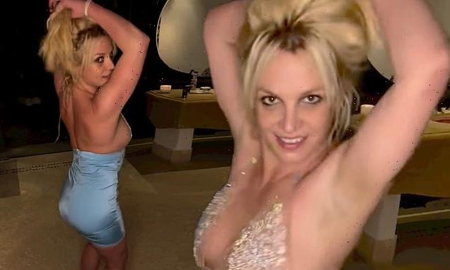 Britney Spears flaunts her figure in a skimpy mini dress