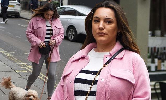 Kelly Brook looks casual in a pink shacket as she enjoys a stroll