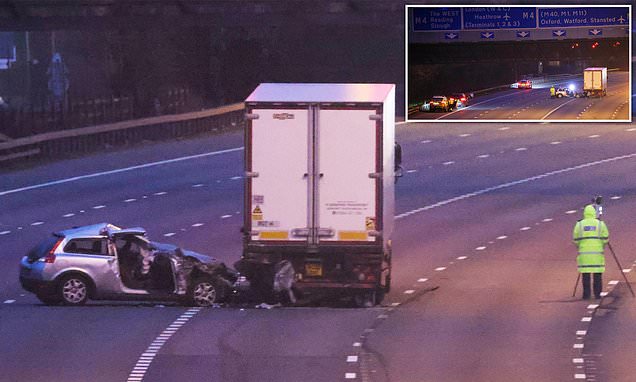 M25 is closed after car crashes into lorry near Heathrow airport