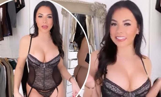 Paige Thorne sets pulses racing as she lips into black lingerie