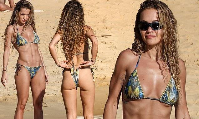 Rita Ora displays her figure in a TINY thong bikini  in Sydney