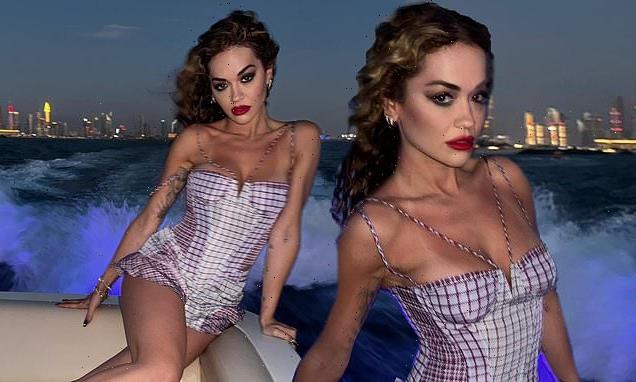Rita Ora puts on a leggy display in a mauve checked minidress in Dubai