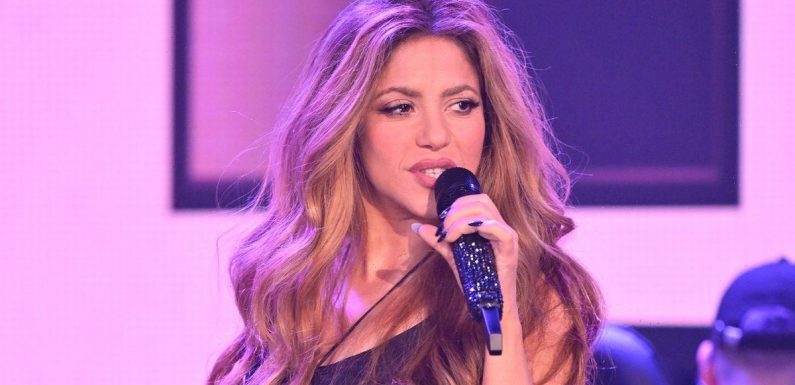 Shakira says she’s ‘been through cr*p’ as she sings Pique track in sheer top