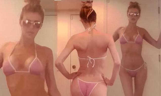 Brandi Glanville, 50, models a skimpy string bikini