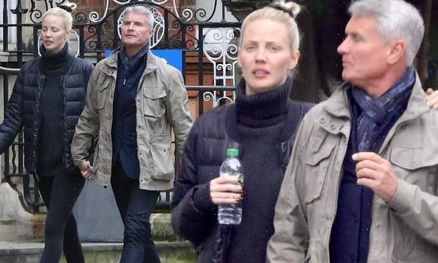 David Coulthard, 52, looks cosy with his model girlfriend, 27