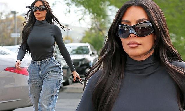 Kim Kardashian flaunts her famous curves in figure-hugging jeans