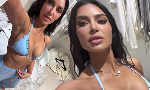 Kim Kardashian showcases her figure in barely there bikinis