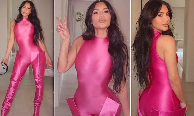 Kim Kardashian showcases her voluptuous curves in pink SKIMS catsuit