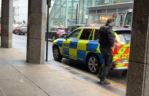 Moment police walk out of McDonald's having parked on a double yellow