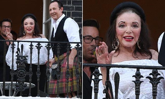 Joan Collins looks glamorous at her 90th birthday party