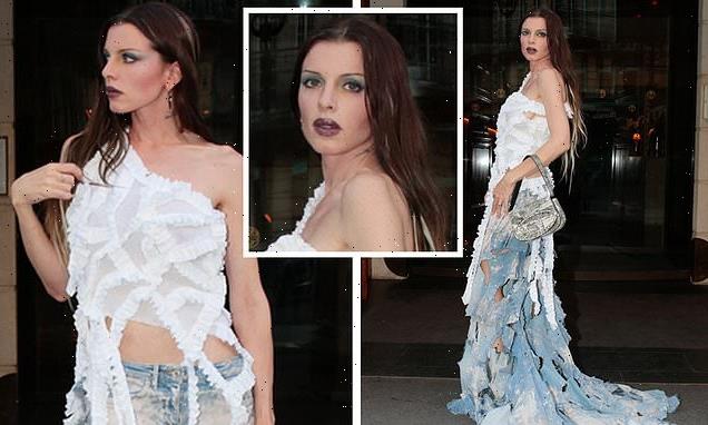 Julia Fox pushes fashion boundaries AGAIN with shredded pants in Paris