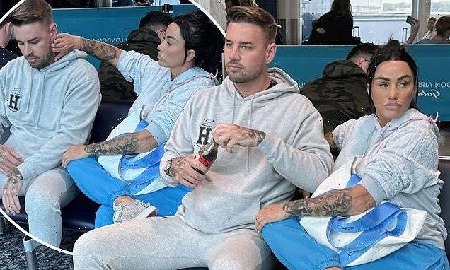 Katie Price and on-off fiancé Carl Woods appear smitten at Gatwick