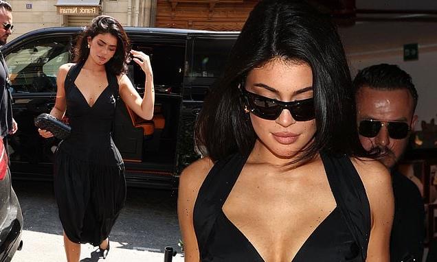 Kylie Jenner puts on a busty display in a 1950s style dress in Paris