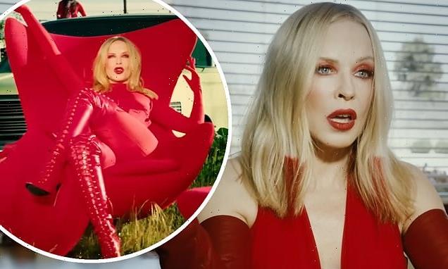 Kylie Minogue, 54, is every inch the vixen in sexy red-themed video