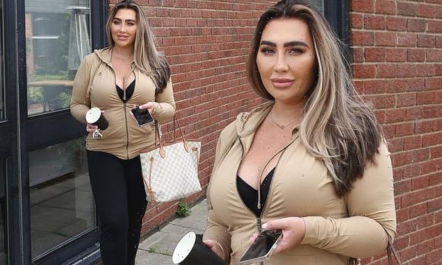 Lauren Goodger puts on a busty display in a plunging zip-up hoodie