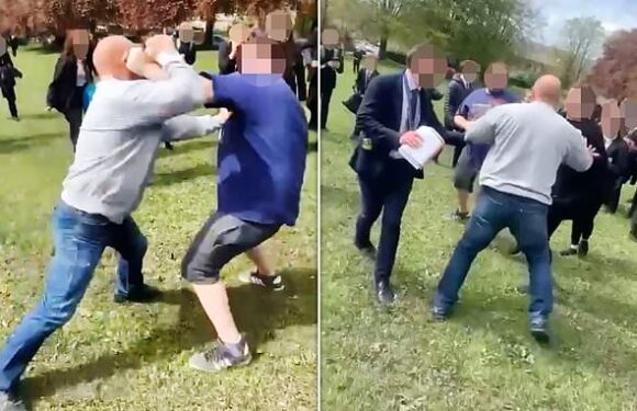 Shocking moment pair of FATHERS brawl on school playing fields