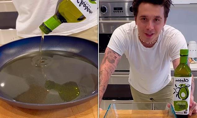 Brooklyn Beckham shocks by frying chicken in expensive oil