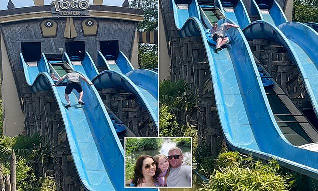 Father climbs up waterslide to rescue his terrified daughter