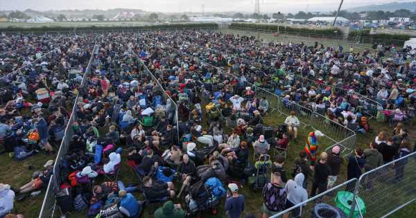 Glastonbury queue begins as revellers fume stewards woke them up to move 10ft