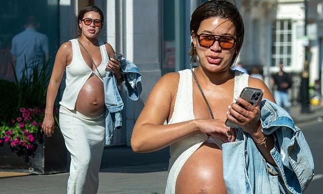 Montana Brown shows off her bump in a white crop top